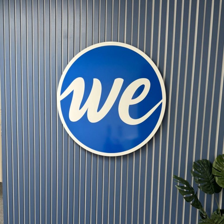 Vinyl office branding for WE | The Vinyl Bay Vinyl Office branding installation for WE